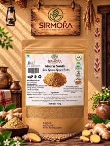Ghoru Sonth powder in a traditional wooden bowl, with fresh ginger and Himalayan mountains in the background. 